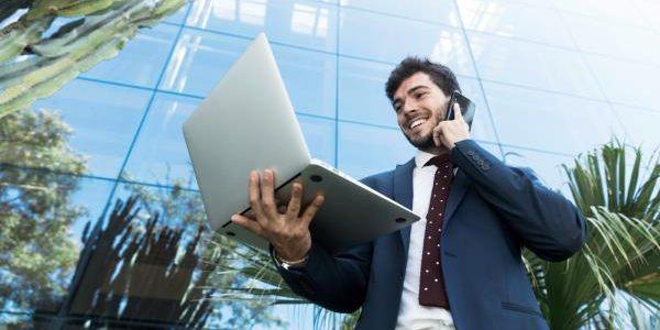 Low angle lawyer looking at his laptop
