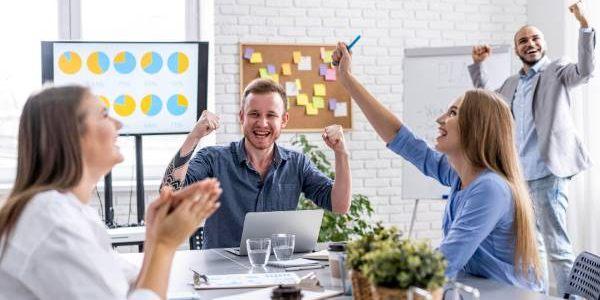 Young people collaborating at meeting