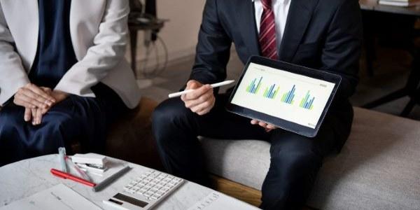 Business people working with ipad high angle