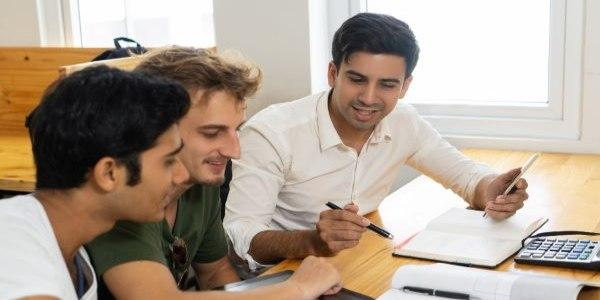 Three partners discussing about business
