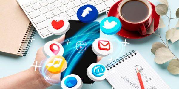 Hand holding smartphone social media concept