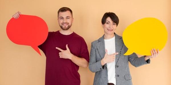 Two persons holding chat box