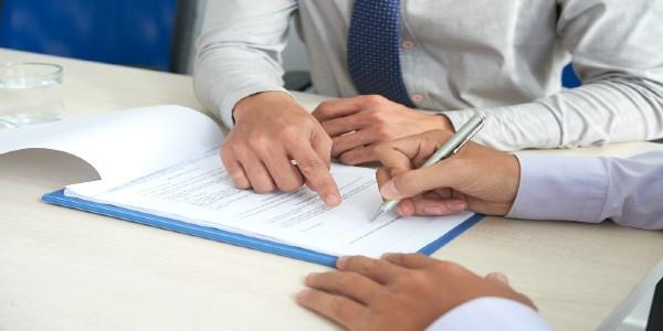 Signing a Contract of Sale Document