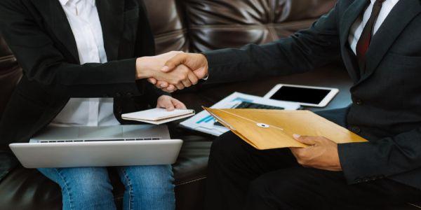 Businessmen and women shake hands confidently professional investor working with new startup project