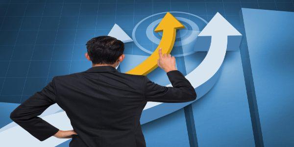 Composite image of asian businessman pointing