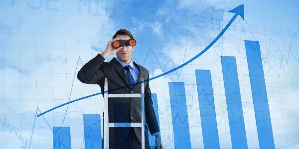 Composite image of businessman looking on a ladder