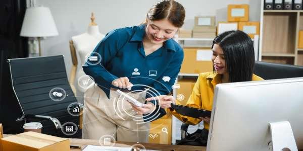 Two young women work in back office for checking the product in the warehouse concept e commerce