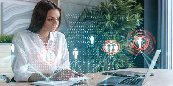 Businesswoman at workplace working with laptop