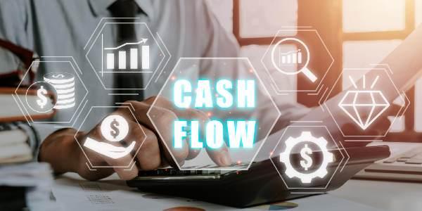 Cash flow concept businessman using calculator and analyzing business chart