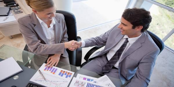 Business people agreeing on a deal