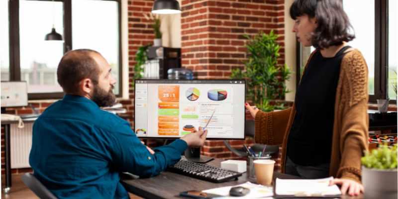 woman-listening-businessman-office